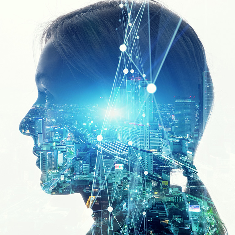 female head silhouette with a city scene superimposed on it