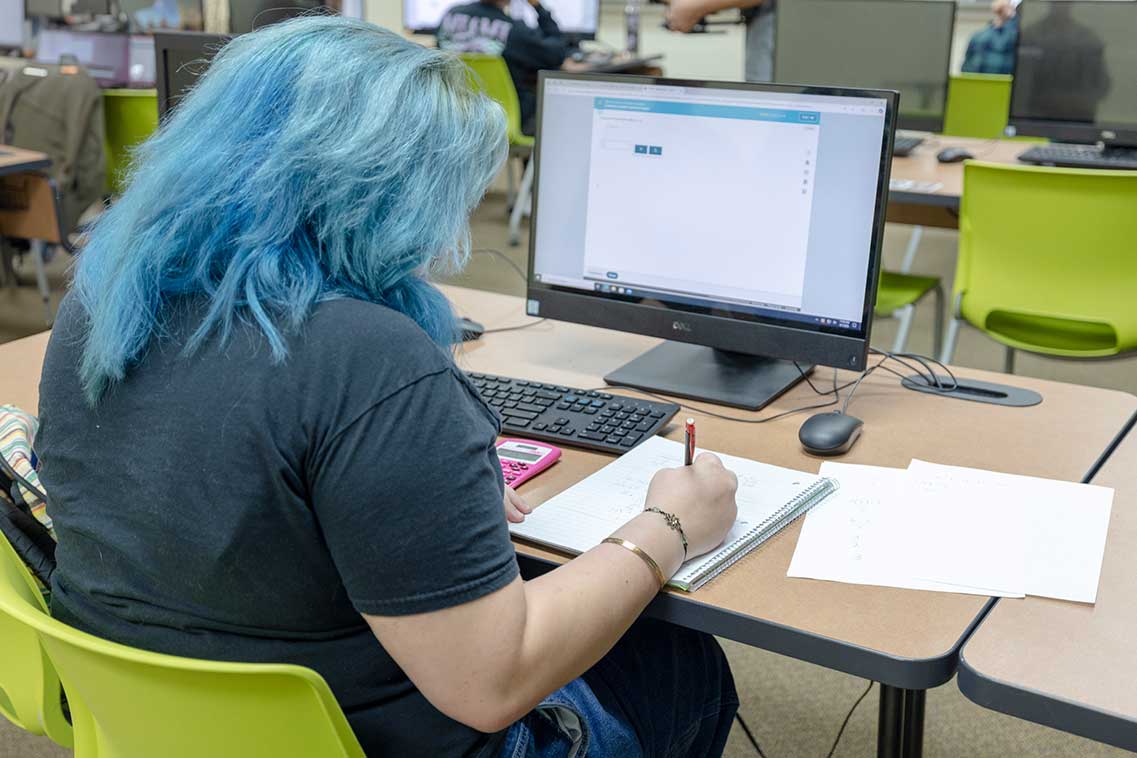 a student at her desk at the cookeville center