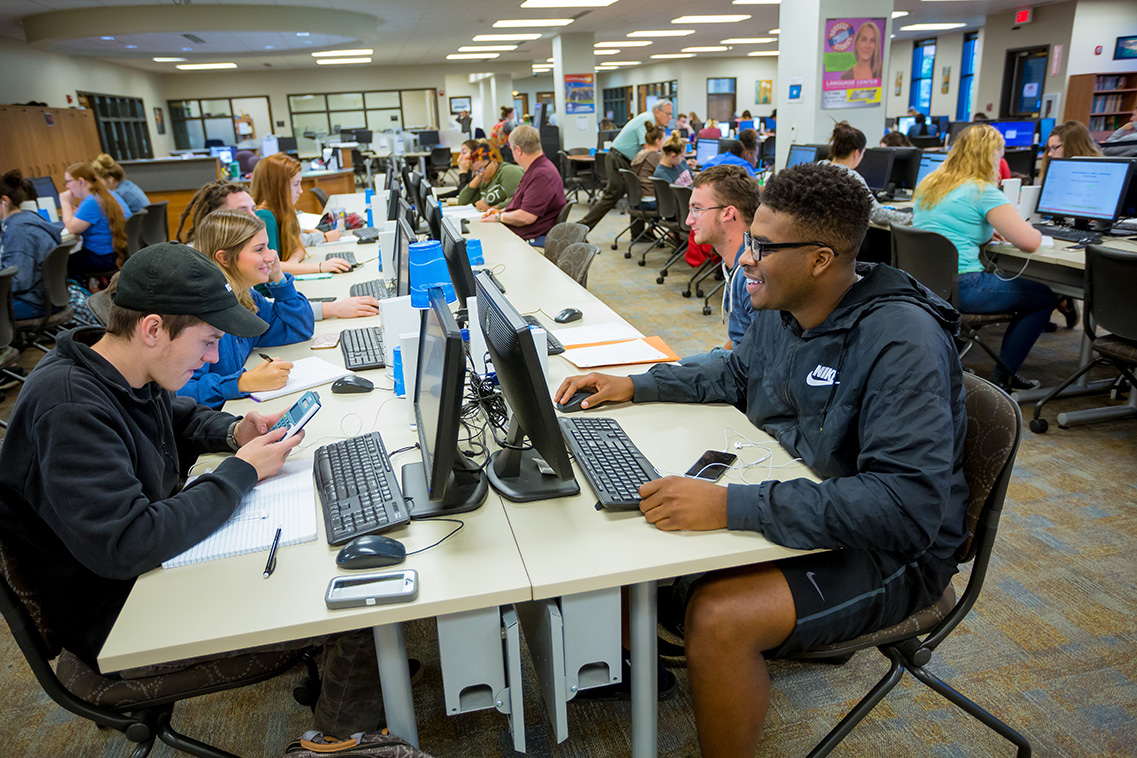 students being helped as the Learning Commons