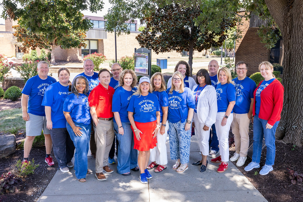 staff members showing their school spirit