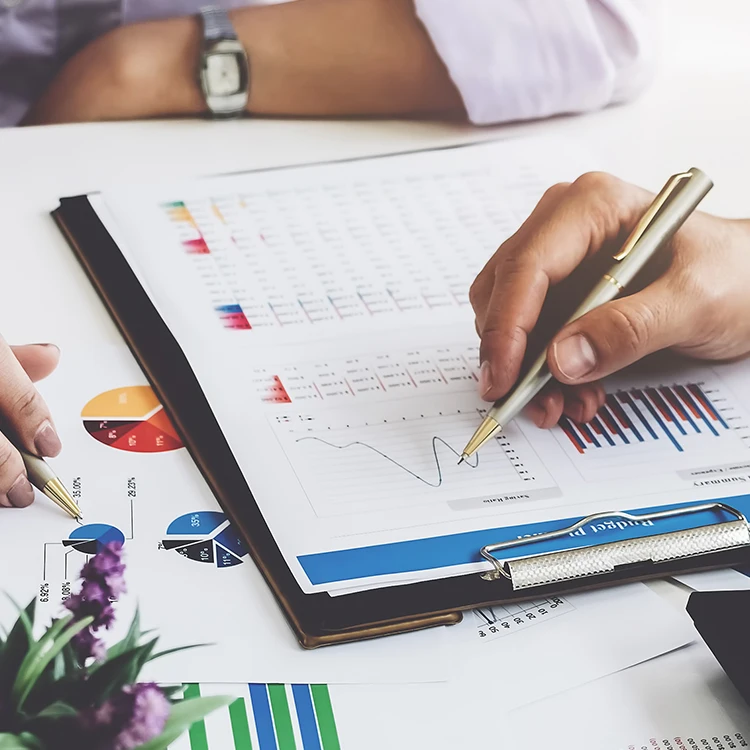 two business professionals crunching the numbers