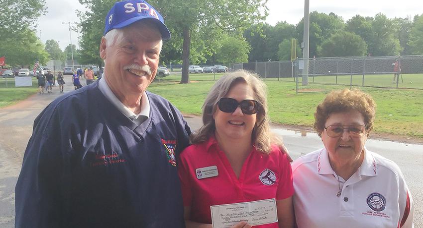 Softball Players Association check presentation