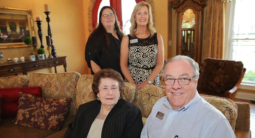 Sandra McFarland and Vol State president, Jerry Faulkner. Standing: Susan Redmond-Vaught, daughter; and College Foundation executive director, Karen Mitchell.
