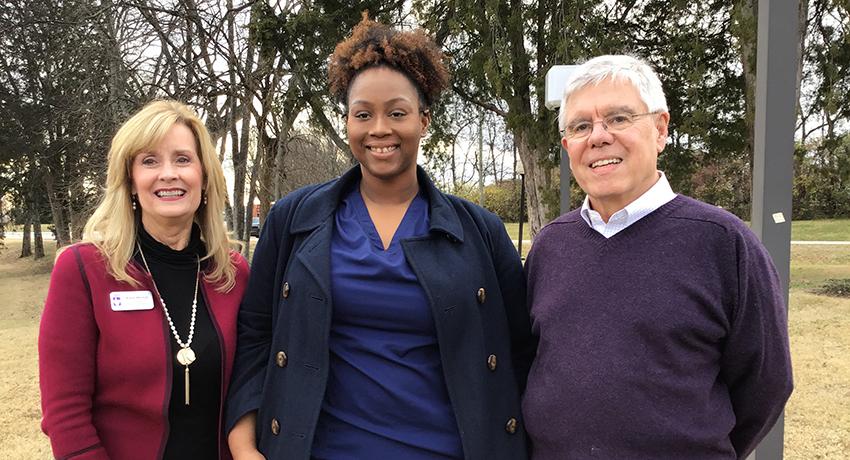  Pictured left to right: Karen Mitchell, vice president for Resource Development; LaTisha Hill; and Bill Hudgins, scholarship donor.