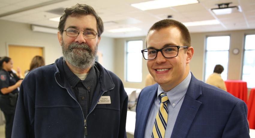  Jackson Carter (right) teaches criminal justice classes at Vol State. He is shown here with History professor, Greg Pryor.