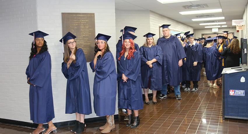 students lined up for the start of commencement
