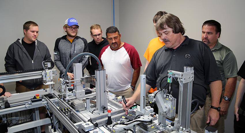 Instructor leading a class on Mechatronics