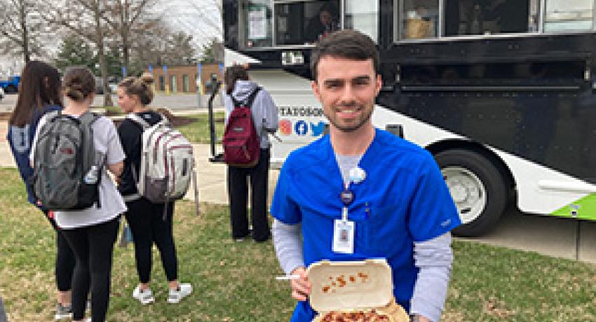 food truck customer displaying his lunch
