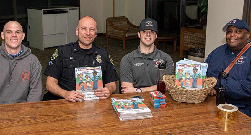 local law enforcement officers helping with read across america