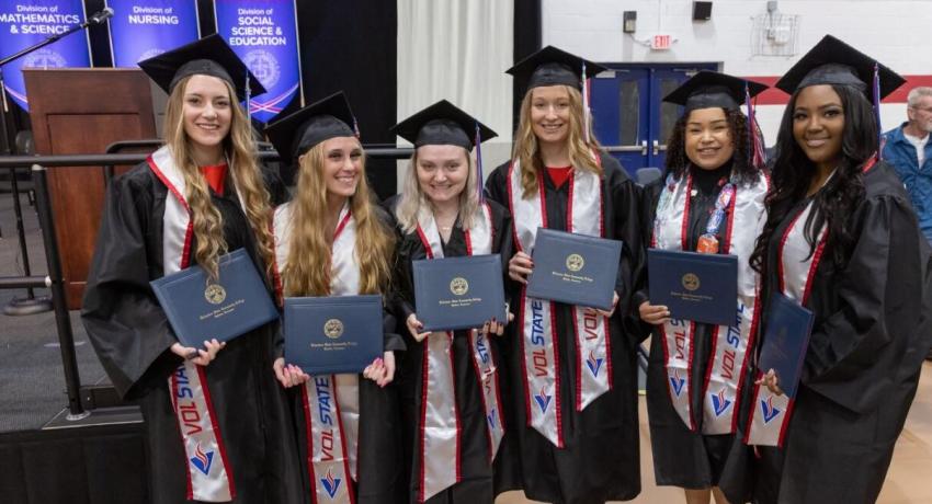 Graduates celebrating after the ceremony. 