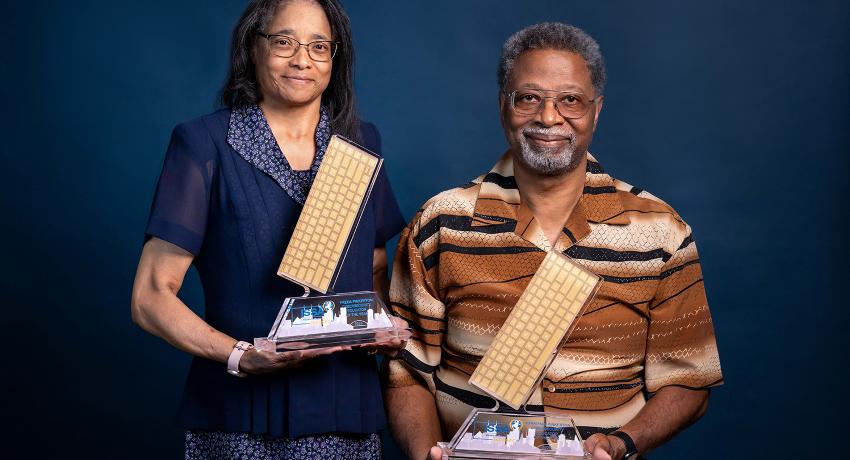 Freda and Jonathan Pinkerton holding their awards