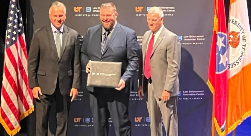 Chief Pennington accepting his certificate