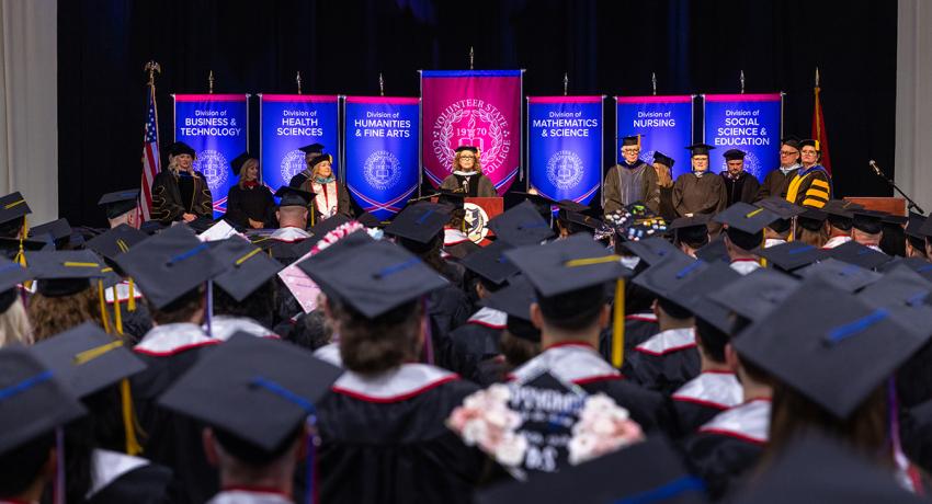 a view of the stage from a graduate's perspective