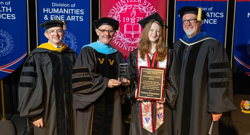 Outstanding Graduate, Cadence Zimmerman, standing with Vol State faculty at the Spring 2026 Commencement