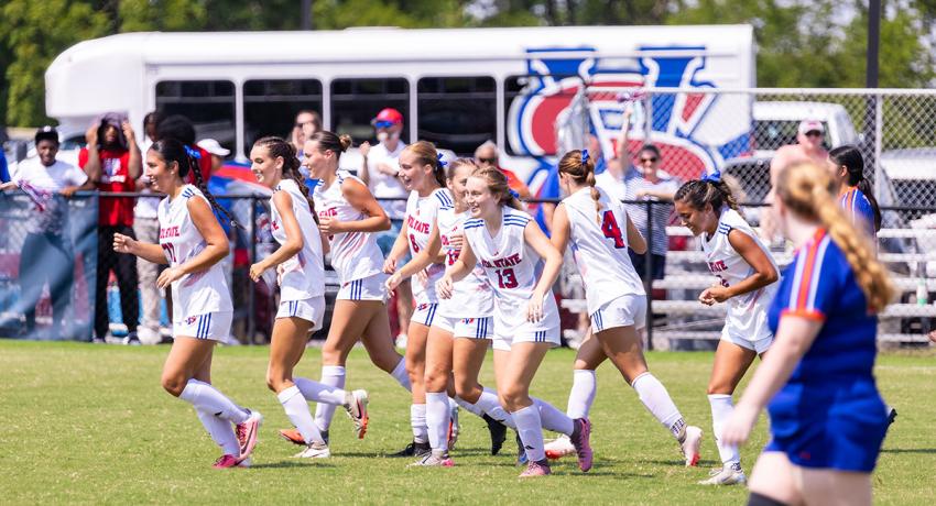 The Vol State women's soccer team celebrates after scoring a goal